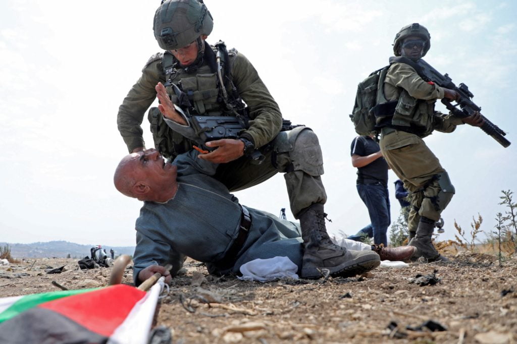 Israeli soldiers detain a Palestinian protester during a demonstration against the Israeli settlement expansion in the village of Jbara, south of Tulkarm in the occupied West Bank, on September 1, 2020. (Photo by JAAFAR ASHTIYEH / AFP)