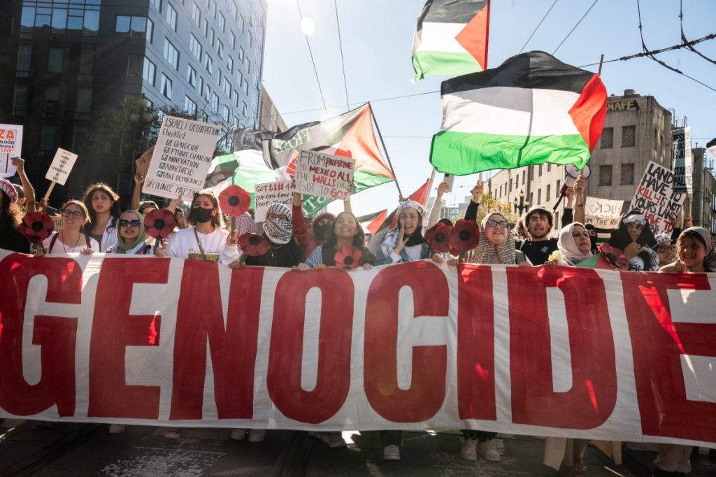 People take part in a "Palestine Solidarity" march in San Francisco, California, on November 4, 2023. - Thousands of people, both Israeli and Palestinians, have died since October 7, 2023, after Palestinian Hamas militants based in the Gaza Strip, entered southern Israel in a surprise attack leading Israel to declare war on Hamas in Gaza the following day. (Photo by Amy OSBORNE / AFP)