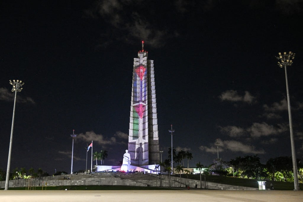 HAVANA, CUBA - NOVEMBER 17: A general view of the Jose Martí Memorial adorned with illuminated Cuban and Palestinian flags, on November 17, 2023, in Havana, Cuba. Cuban President Miguel Díaz-Canel attended the solidarity cantata supporting the Palestinian people at the Jose Martí Memorial. (Photo by Artur Widak/NurPhoto) (Photo by Artur Widak / NurPhoto / NurPhoto via AFP)