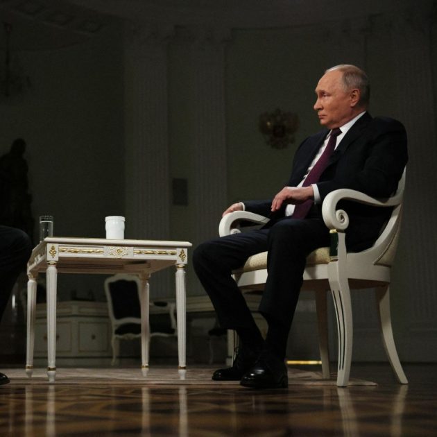 In this pool photograph distributed by Russian state agency Sputnik, Russia's President Vladimir Putin gives an interview to US talk show host Tucker Carlson at the Kremlin in Moscow on February 6, 2024. (Photo by Gavriil GRIGOROV / POOL / AFP)