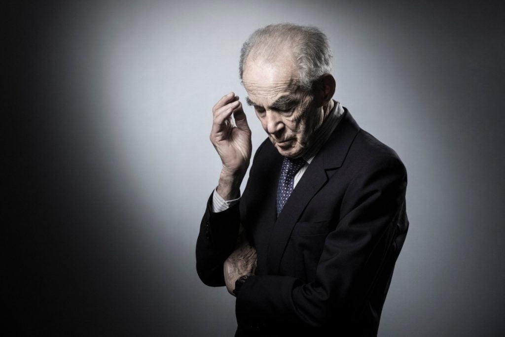 (FILES) Former French Justice Minister Robert Badinter poses in his office during a photo session in Paris on April 19, 2018. - Former French justice minister Robert Badinter, who in 1981 brought an end to capital punishment in France, has died aged 95, his aide Aude Napoli told AFP on February 9, 2024. Badinter, who also served as head of France's highest administrative instance the Constitutional Council, died overnight, she said. Months after taking office under Socialist President Francois Mitterrand, Badinter successfully brought a law before parliament prohibiting capital punishment. Executions had been carried out with the guillotine. (Photo by JOEL SAGET / AFP)
