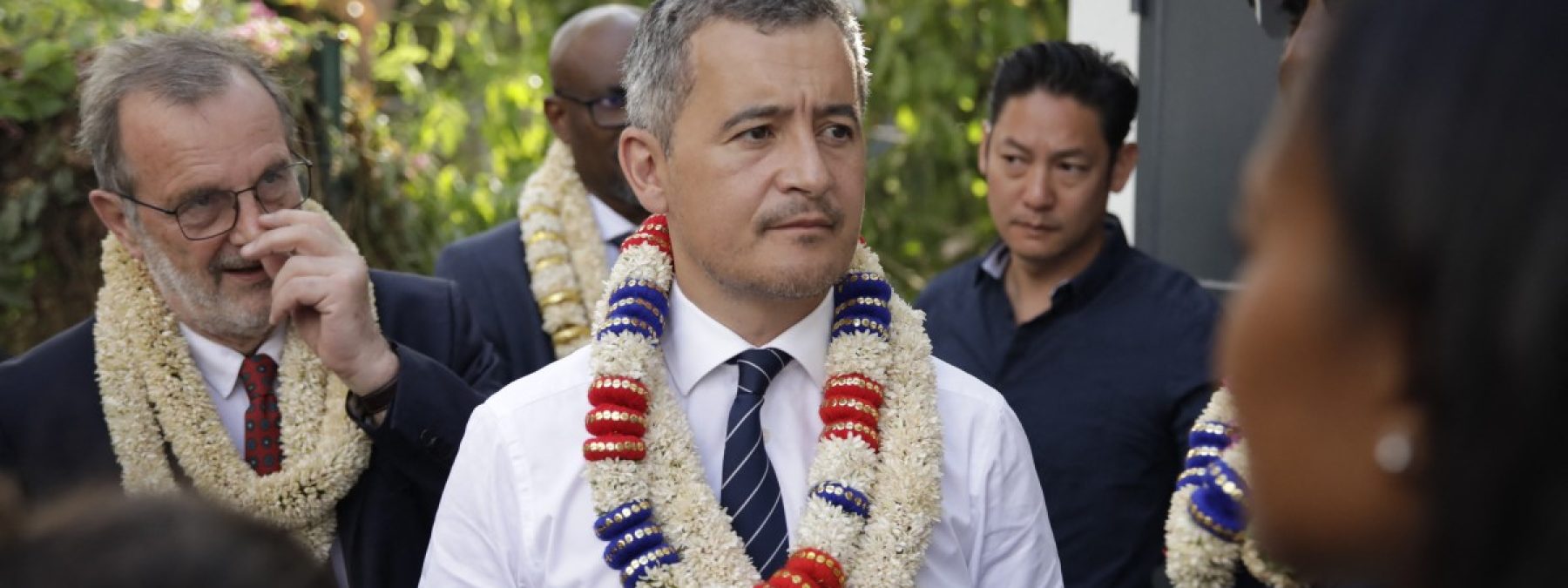 (FILES) French Interior and Overseas Minister Gerald Darmanin (C) attends a visit to a surveillance centre in Mamoudzou, on the French Indian Ocean island of Mayotte, on June 25, 2023. - Gerald Darmanin announced on February 11, 2024 a constitutional amendment to eliminate "Jus Soli", the acquisition of citizenship by birth within a territory, on the Indian Ocean island of Mayotte, which faces an ongoing migration crisis. (Photo by Chafion MADI / AFP)