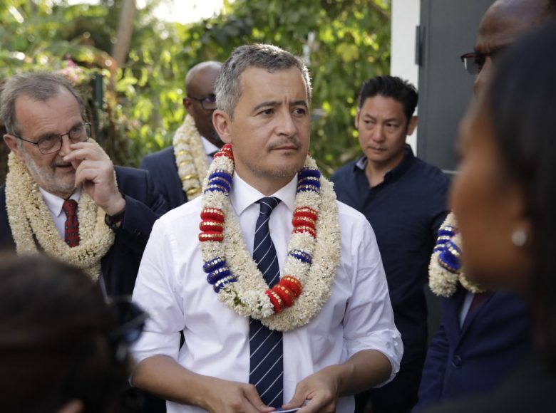 (FILES) French Interior and Overseas Minister Gerald Darmanin (C) attends a visit to a surveillance centre in Mamoudzou, on the French Indian Ocean island of Mayotte, on June 25, 2023. - Gerald Darmanin announced on February 11, 2024 a constitutional amendment to eliminate "Jus Soli", the acquisition of citizenship by birth within a territory, on the Indian Ocean island of Mayotte, which faces an ongoing migration crisis. (Photo by Chafion MADI / AFP)