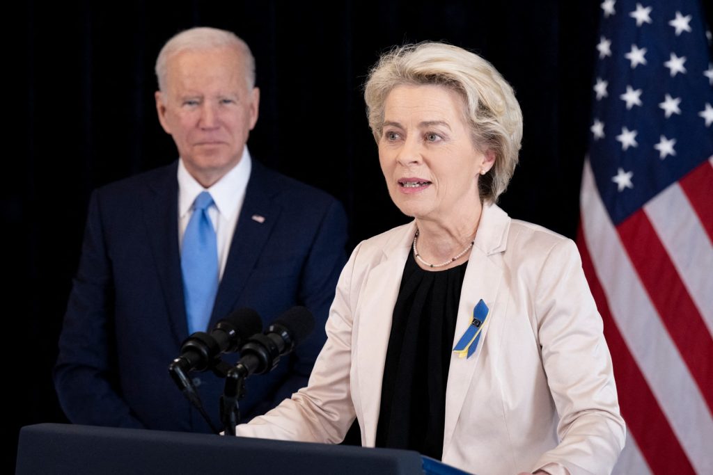 US President Joe Biden listens while European Commission President Ursula von der Leyen makes a statement about Russia at the US Chief of Mission residence in Brussels, on March 25, 2022. (Photo by Brendan Smialowski / AFP)