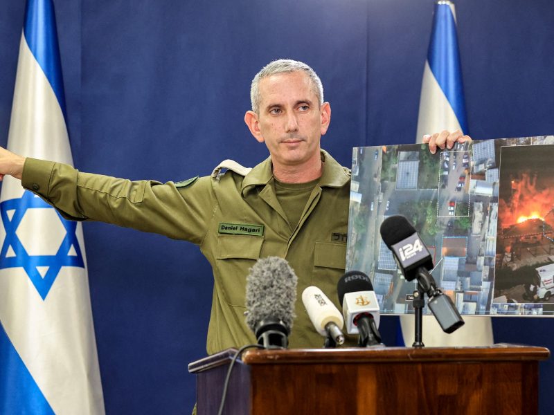 Israeli army spokesman Rear Admiral Daniel Hagari speaks to the press from The Kirya, which houses the Israeli Ministry of Defence, in Tel Aviv on October 18, 2023. A blast ripped through a hospital in war-torn Gaza killing hundreds of people late on October 17, sparking global condemnation and angry protests around the Muslim world. Spokesman Hagari on October 18 said that Israel had "evidence" that militants were responsible for the blast that killed hundreds at a Gaza hospital, saying a review proved others were at fault. (Photo by GIL COHEN-MAGEN / AFP)