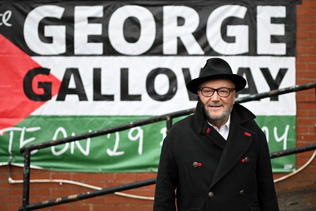 The new Workers Party Member of Parliament for Rochdale, George Galloway poses for a photograph outside his campaign headquarters in Rochdale, northern England on March 1, 2024, on the day he was elected as MP following a by-election. - Left-wing firebrand George Galloway was elected to the UK parliament on Friday after tapping into anger over the Israel-Hamas war in a chaotic by-election marred by anti-Semitism allegations. Galloway, 69, first became an MP in 1987 and will return to the House of Commons for the first time since 2015 after winning the seat of Rochdale, in northwest England, by nearly 6,000 votes. (Photo by Oli SCARFF / AFP)