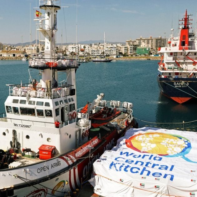 This handout photograph released on March 12, 2024 by the Proactiva Open Arms (POA) shows the Open Arms vessel with the humanitarian food aid at the Cypriot port of Larnaca. - A Spanish charity ship taking 200 tonnes of humanitarian food aid to war-ravaged Gaza set sail from the Mediterranean island of Cyprus on March 12, aiming to pioneer a "maritime corridor".
