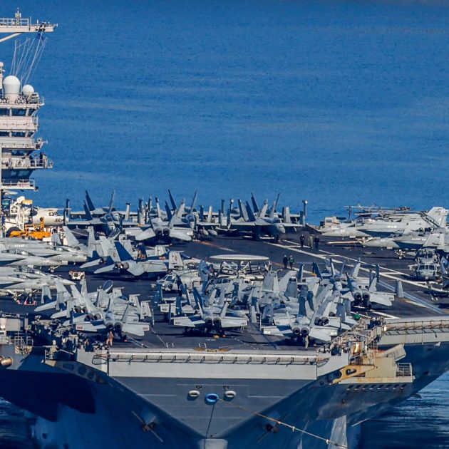 The US Navy aircraft carrier USS Gerald R. Ford departs Souda Bay on the island of Crete on February 26, 2026. (Photo by Costas METAXAKIS / AFP)