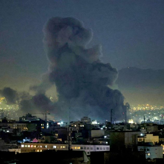Smoke plumes rise following missile strikes in Tehran on March 1, 2026. The United States and Israel launched strikes against Iran on February 28, killing Iran's supreme leader and top military leaders, prompting authorities to retaliate with strikes on Israel and US bases across the Gulf. (Photo by ATTA KENARE / AFP)
