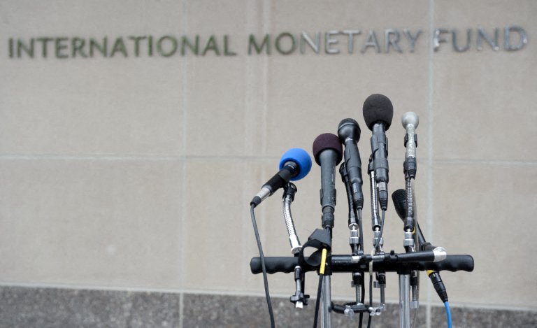 A microphone stand sits in front of International Monetary Fund (IMF) Headquarters in Washington, DC, May 16, 2011 in preparation for a statement to the press. The organization's director, Dominique Strauss-Kahn, faced arraignment in New York earlier Monday on allegations of sexual assault. AFP PHOTO / Saul LOEB (Photo by SAUL LOEB / AFP)