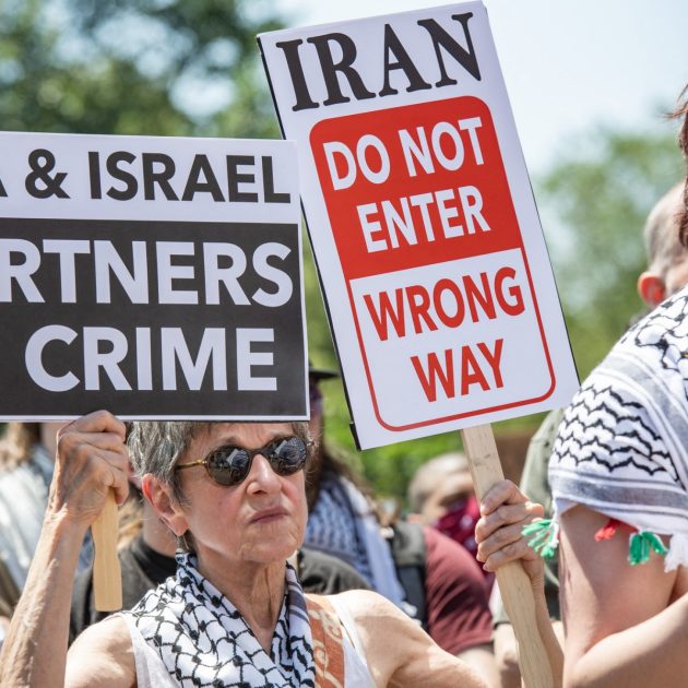 People take part in an anti-war demonstration in Boston, Massachusetts, on June 22, 2025, protesting US strikes on Iranian nuclear sites. The surprise US strikes on June 21 threaten to deepen conflict in the Middle East after Israel launched a bombing campaign against Iran, with Tehran vowing to retaliate against US involvement. (Photo by Joseph Prezioso / AFP)