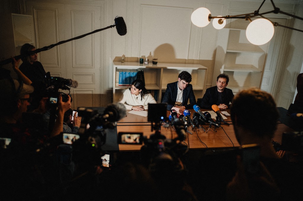 Flash photo of Rima Hassan European deputy and member of the political party La France Insoumise LFI speaking alongside her lawyer Vincent Brengarth during a press conference held by Rima Hassan European deputy and member of the political party La France Insoumise LFI with her lawyer following a hearing at the regional headquarters of the judiciary police of Paris in Paris France on April 3, 2026. (Photo by Bastien Ohier / Hans Lucas via AFP)
