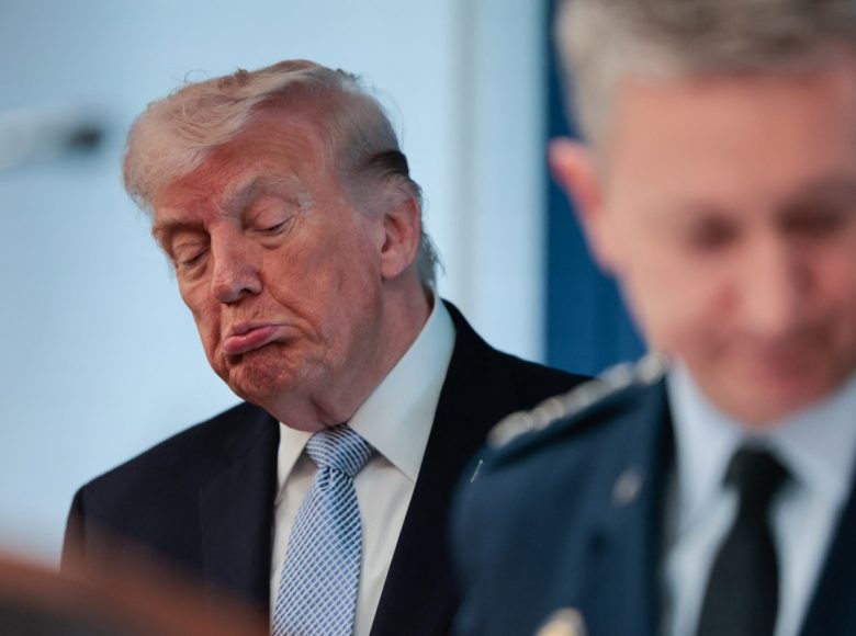 US President Donald Trump (L) looks on as Chairman of the Joint Chiefs of Staff General Dan Caine (R) speaks about the conflict in Iran in the James S. Brady Press Briefing Room of the White House on April 6, 2026, in Washington, DC. (Photo by Kent Nishimura / AFP)