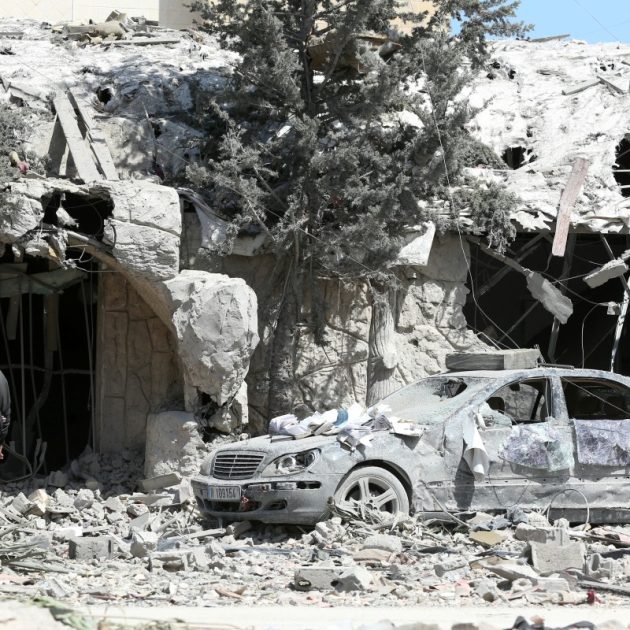 A man checks the site of an Israeli airstrike that targeted a religious Shiite complex the day before in the southern Lebanese coastal city of Sidon on April 9, 2026. Calls were mounting for the ceasefire between the US and Iran to be extended to Israel's war with Hezbollah, after a massive wave of Israeli strikes on Lebanon killed more than 200 people. (Photo by Mahmoud ZAYYAT / AFP)