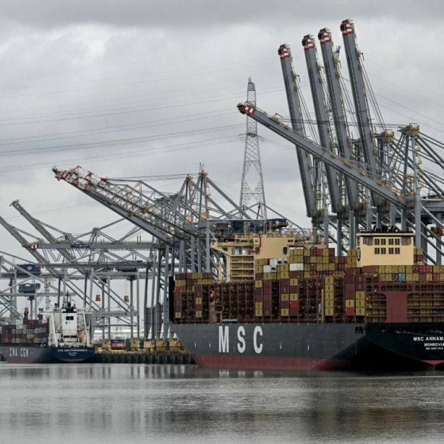 An MSC operated container ship is docked in a harbour basin in Europe's second-largest port of Antwerp, northern Belgium, where shipping is largely halted following an oil spill at one of its docks, on April 10, 2026. A port statement said the spill occurred during a "bunkering operation", the process of filling a ship with fuel, in the Deurganck Dock and was "causing significant disruption" to shipping. Deurganck is one of the port's most important container docks, used by some of the largest ships in the world to load and unload goods. (Photo by NICOLAS TUCAT / AFP)