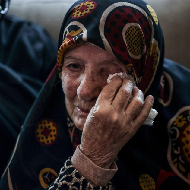 A relative of Hassan Ali Badawi, a paramedic with the Lebanese Red Cross who was killed the previous day in an Israeli airstrike, mourns as the family receives condolences at their home in the Bchamoun area south of Beirut, on April 13, 2026. Lebanon's health ministry said at least six people were killed on April 12 in the south, including a Red Cross paramedic, after "the Israeli enemy directly targeted a Lebanese Red Cross ambulance team". (Photo by Anwar AMRO / AFP)