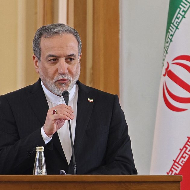 Iranian Foreign Minister Abbas Araghchi attends a joint press conference with his Iraqi counterpart Fuad Hussein, in Tehran on January 18, 2026. (Photo by ATTA KENARE / AFP)