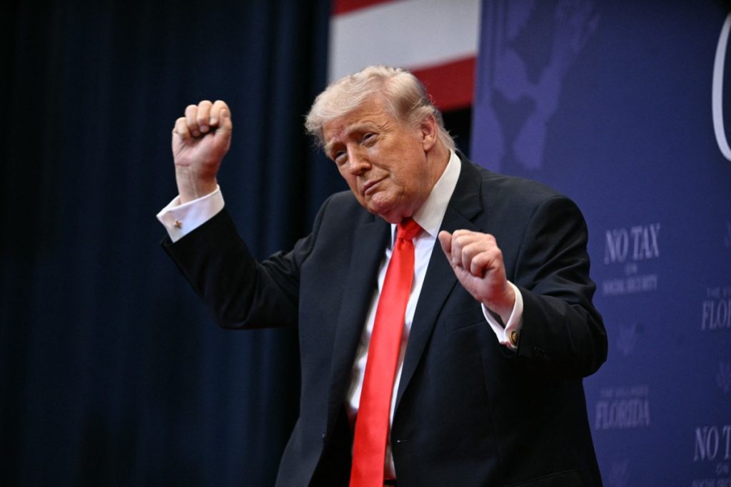 US President Donald Trump does his little dance after giving a speech about taxes and Social Security in The Villages, Florida, on May 1, 2026. (Photo by Jim WATSON / AFP)