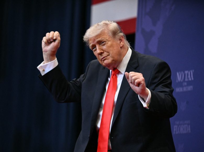 US President Donald Trump does his little dance after giving a speech about taxes and Social Security in The Villages, Florida, on May 1, 2026. (Photo by Jim WATSON / AFP)