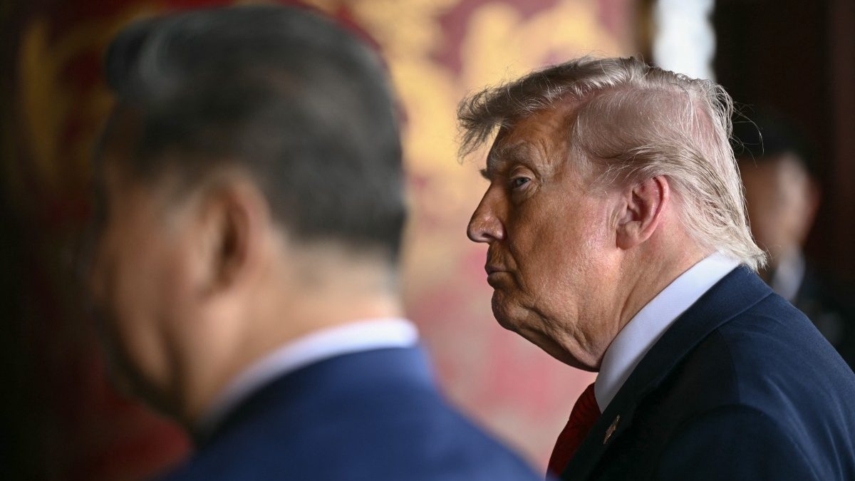 China's President Xi Jinping (L) and US President Donald Trump visit the Temple of Heaven in Beijing on May 14, 2026. Xi warned Trump that the issue of Taiwan could push their two countries into "conflict" if mishandled, a stark opening salvo as a superpower summit set to tackle numerous thorny issues began in Beijing on May 14. (Photo by Brendan SMIALOWSKI / POOL / AFP)