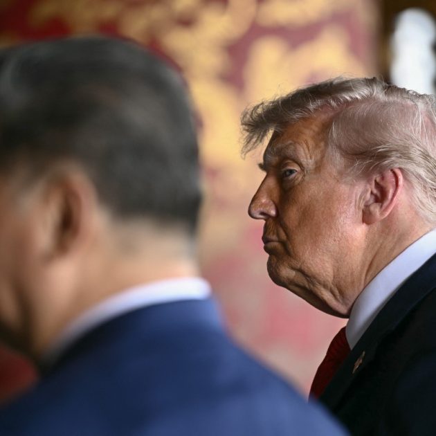 China's President Xi Jinping (L) and US President Donald Trump visit the Temple of Heaven in Beijing on May 14, 2026. Xi warned Trump that the issue of Taiwan could push their two countries into "conflict" if mishandled, a stark opening salvo as a superpower summit set to tackle numerous thorny issues began in Beijing on May 14. (Photo by Brendan SMIALOWSKI / POOL / AFP)