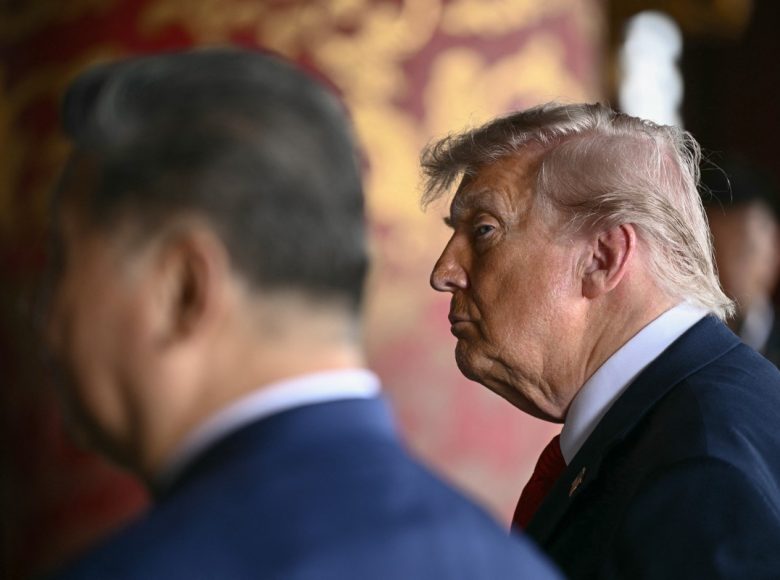 China's President Xi Jinping (L) and US President Donald Trump visit the Temple of Heaven in Beijing on May 14, 2026. Xi warned Trump that the issue of Taiwan could push their two countries into "conflict" if mishandled, a stark opening salvo as a superpower summit set to tackle numerous thorny issues began in Beijing on May 14. (Photo by Brendan SMIALOWSKI / POOL / AFP)