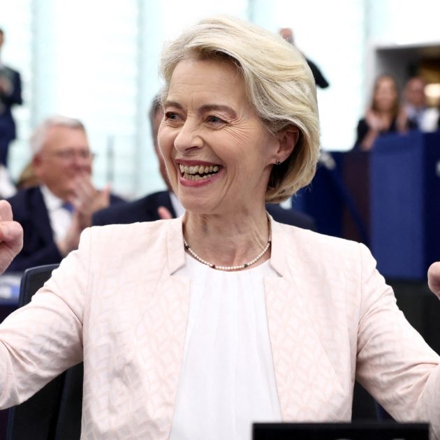 European Commission President Ursula von der Leyen celebrates after she was re-elected for a second term at The European Parliament in Strasbourg, eastern France on July 18, 2024. EU lawmakers on July 18 handed Ursula von der Leyen another five-year term as European Commission president during their first parliamentary session since June elections. Von der Leyen won with the support of 401 MEPs in the 720-seat chamber -- comfortably over the 361-vote majority she needed to remain head of the EU's executive body. There were 284 who voted against in the secret ballot. (Photo by FREDERICK FLORIN / AFP)