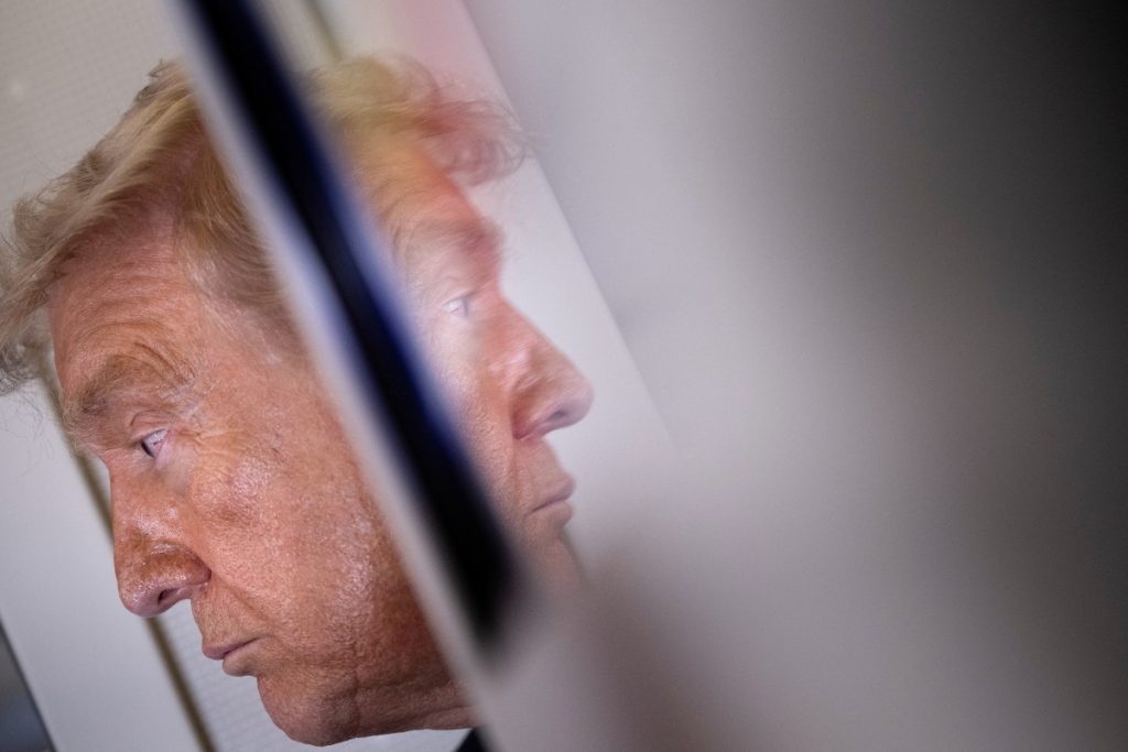 US President Donald Trump speaks to reporters aboard Air Force One after his departure from Beijing Capital Airport on May 15, 2026, on his way back to the United States. Trump said he had made "fantastic trade deals" with China's Xi Jinping, as the pair met on May 15 at final talks of a superpower summit that according to the US leader has also reaped a Chinese offer to help open the Strait of Hormuz. (Photo by Brendan Smialowski / AFP)