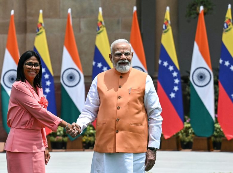 Venezuela's interim President Delcy Rodriguez (L) shakes hands with India's Prime Minister Narendra Modi before their meeting at the Hyderabad House in New Delhi on June 4, 2026. (Photo by Arun SANKAR / AFP)