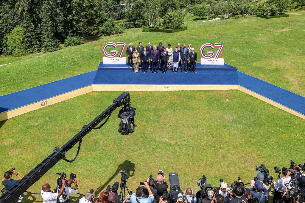 (From L) European Council President Antonio Costa, Italy's Prime Minister Giorgia Meloni, South Korea's President Lee Jae Myung, Egypt's President Abdel Fattah El-Sisi, Britain's Prime Minister Keir Starmer, US President Donald Trump, Kenya's President William Ruto, France's President Emmanuel Macron, Japan's Prime Minister Sanae Takaichi, India's Prime Minister Narendra Modi, Canada's Prime Minister Mark Carney, Germany's Chancellor Friedrich Merz, European Commission President Ursula von der Leyen and Brazil's President Luiz Inacio Lula da Silva pose for a family photograph during the G7 summit, in Evian, eastern France, on June 16, 2026. A G7 summit is set to take place June 15 to 17 in the French town of Evian-les-Bains near Switzerland and it will be attended by country leaders as well as the EU's foreign policy chief and ministers from Brazil, Canada, the United Arab Emirates and Turkey. (Photo by Dominique JACOVIDES / POOL / AFP)