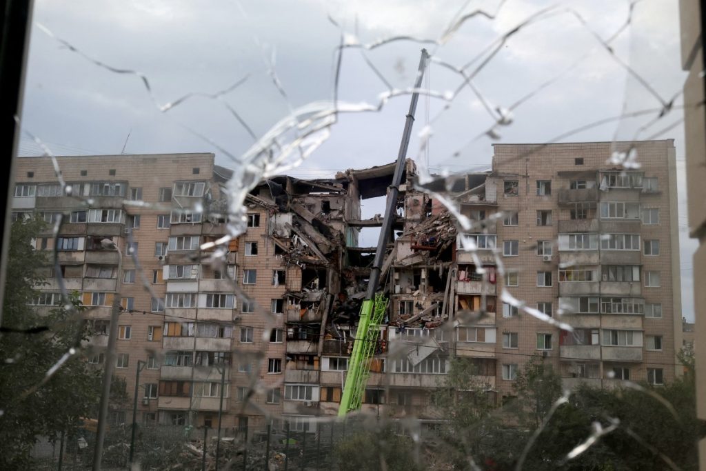 This photograph shows a multistorey residential building partially destroyed as a result of Russian missile strike on the Ukrainian capital of Kyiv on July 6, 2026, amid the Russian invasion in Ukraine. Russia struck Kyiv's capital region with ballistic missiles on Monday, sparking fires and killing at least four people, authorities said, on the eve of a NATO summit in Ankara. (Photo by Serhii Okunev / AFP)
