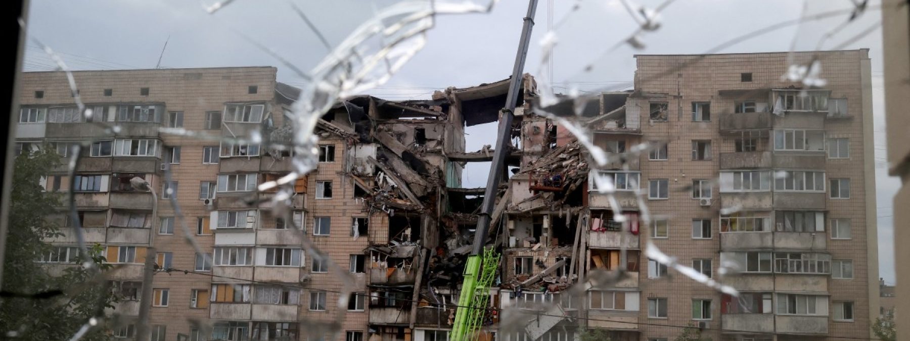 This photograph shows a multistorey residential building partially destroyed as a result of Russian missile strike on the Ukrainian capital of Kyiv on July 6, 2026, amid the Russian invasion in Ukraine. Russia struck Kyiv's capital region with ballistic missiles on Monday, sparking fires and killing at least four people, authorities said, on the eve of a NATO summit in Ankara. (Photo by Serhii Okunev / AFP)