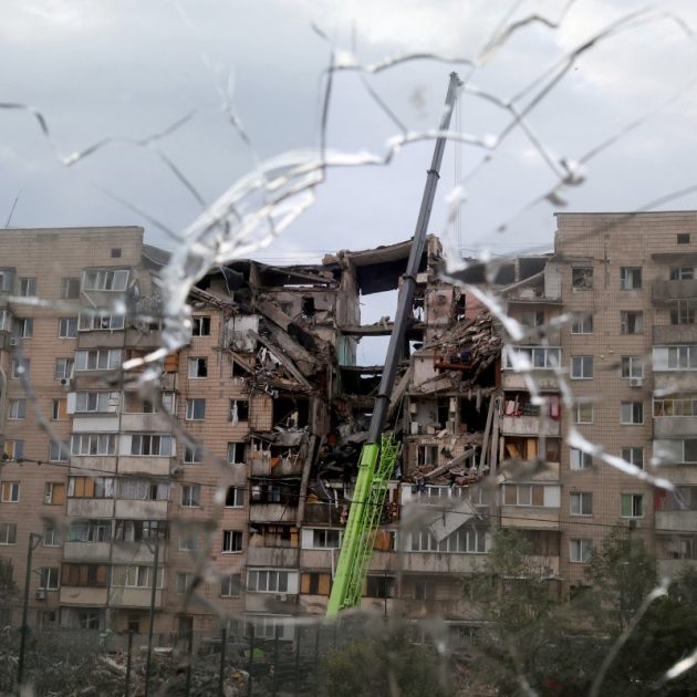 This photograph shows a multistorey residential building partially destroyed as a result of Russian missile strike on the Ukrainian capital of Kyiv on July 6, 2026, amid the Russian invasion in Ukraine. Russia struck Kyiv's capital region with ballistic missiles on Monday, sparking fires and killing at least four people, authorities said, on the eve of a NATO summit in Ankara. (Photo by Serhii Okunev / AFP)