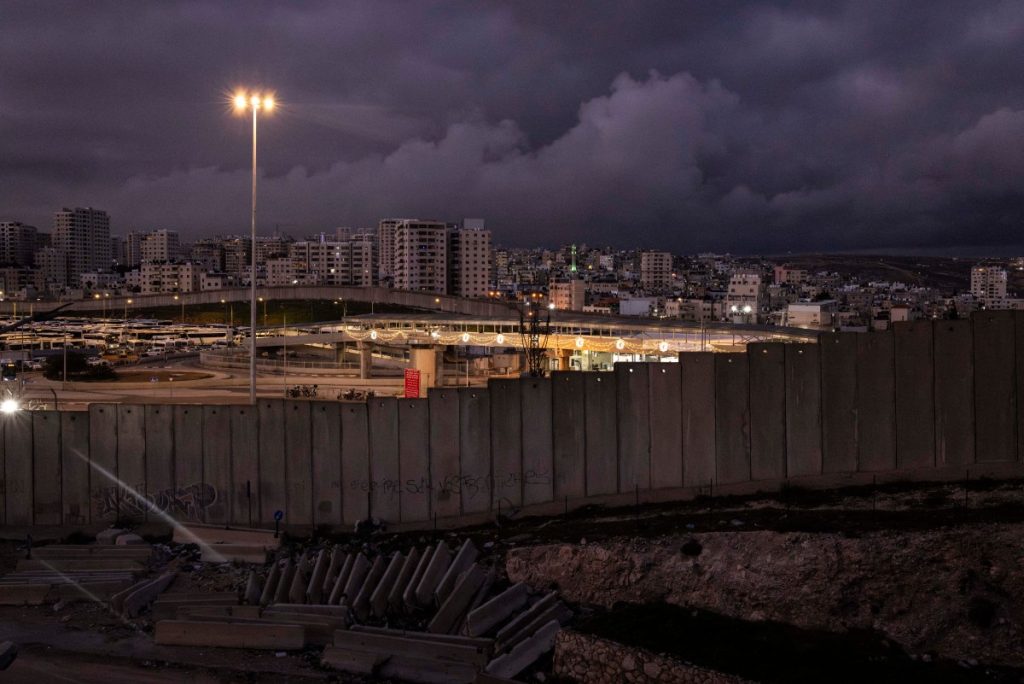 This picture shows a view of the Israeli built controversial separation barrier at Qalandia check point in Al-Ram, in the occupied West Bank on February 24, 2026. (Photo by JOHN WESSELS / AFP)