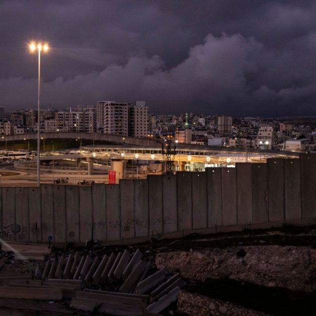 This picture shows a view of the Israeli built controversial separation barrier at Qalandia check point in Al-Ram, in the occupied West Bank on February 24, 2026. (Photo by JOHN WESSELS / AFP)