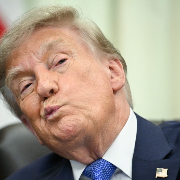 US President Donald Trump looks on before signing an executive order calling for more research and flexibility on vaccines, in the Oval Office of the White House in Washington, DC, on August 10, 2026. Trump signed an executive order Monday pushing for a rethink of school vaccine mandates and repeating calls for the measles-mumps-rubella vaccine to be separated into three individual shots. Curbing vaccines has been a key priority for Health Secretary Robert F. Kennedy Jr, who founded an anti-vaccine nonprofit and has long promoted a disproven link between immunization and autism. (Photo by Jim WATSON / AFP)