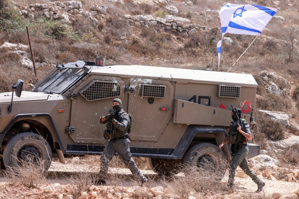 Israeli soldiers arrive in the village of Qusra, south of Nablus in the Israeli-occupied West Bank, which has faced escalating Israeli settler violence over the past month, on August 29, 2026. Dozens of Israeli settlers attacked the Palestinian village of Qusra in the northern occupied West Bank on August 29, residents and the military said, after nearly three weeks of tension in the area. Earlier in August, a group of settlers began blocking supplies from entering Palestinian houses on the outskirts of the village near Nablus, trapping residents inside and drawing domestic and international condemnation. (Photo by Jaafar ASHTIYEH / AFP)