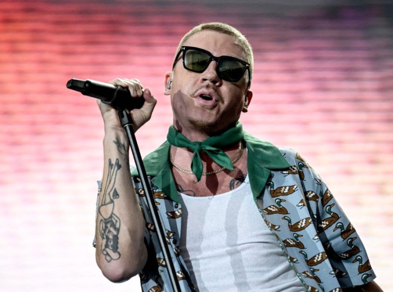 10 September 2023, Berlin: US musician Macklemore performs on stage at the Lollapalooza Festival Berlin on the grounds of the Olympiastadion. Photo: Britta Pedersen/dpa (Photo by BRITTA PEDERSEN / dpa Picture-Alliance via AFP)
