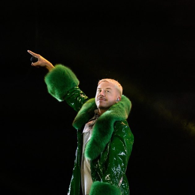 US rapper, singer, dancer and DJ, Benjamin Haggerty, known as Macklemore, performs at the Goldencoast Rap Festival in Corcelles-les-Monts, near Dijon, central-eastern France, on August 30, 2026. (Photo by ARNAUD FINISTRE / AFP)