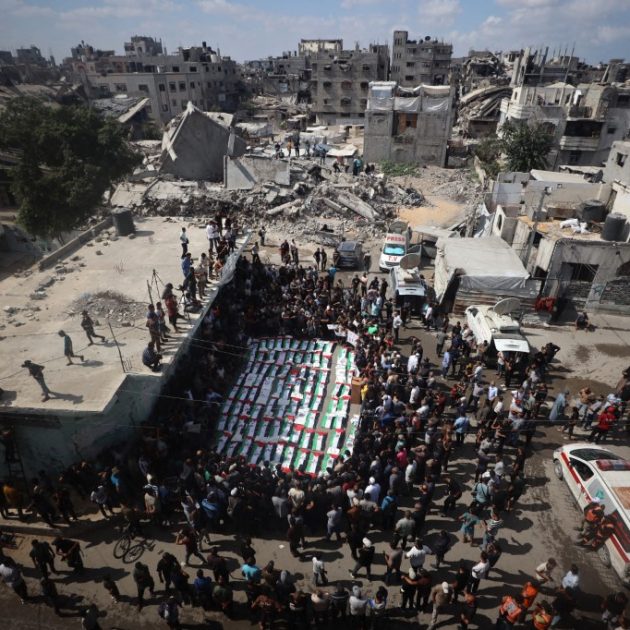 Palestinians attend the mass funeral for members of the Irahem, Malaka, Qanbour, Balawi and Dahdouh families, who were killed in an Israeli strike in 2023 and whose remains were recovered from beneath the rubble, according to Gaza's Civil Defense, in Gaza City, on September 6, 2026. (Photo by Majdi Fathi/NurPhoto) (Photo by MAJDI FATHI / NurPhoto via AFP)