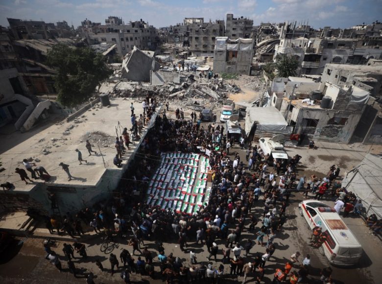 Palestinians attend the mass funeral for members of the Irahem, Malaka, Qanbour, Balawi and Dahdouh families, who were killed in an Israeli strike in 2023 and whose remains were recovered from beneath the rubble, according to Gaza's Civil Defense, in Gaza City, on September 6, 2026. (Photo by Majdi Fathi/NurPhoto) (Photo by MAJDI FATHI / NurPhoto via AFP)