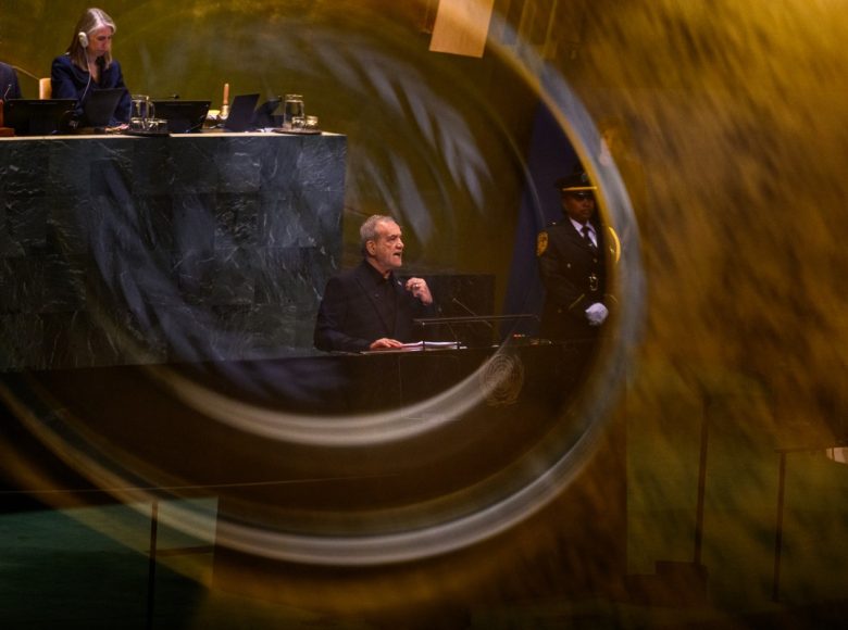 NEW YORK, NEW YORK - SEPTEMBER 23:  (EDITOR'S NOTE: Image was captured in camera using a reflection on a mobile device) President of Iran Masoud Pezeshkian speaks during the 81st session of the United Nations (U.N.) General Assembly at U.N. Headquarters on September 23, 2026 in New York City. World leaders have gathered in New York for the annual session of the United Nations General Assembly, with this year's global issues ranging from the threat of artificial intelligence to the continued wars in Ukraine, Iran and Gaza. Alexi J. Rosenfeld/Getty Images/AFP (Photo by Alexi J. Rosenfeld / GETTY IMAGES NORTH AMERICA / Getty Images via AFP)